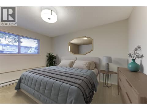 Virtually staged primary bedroom at 246 Briarwood Road, Rutland North, Kelowna