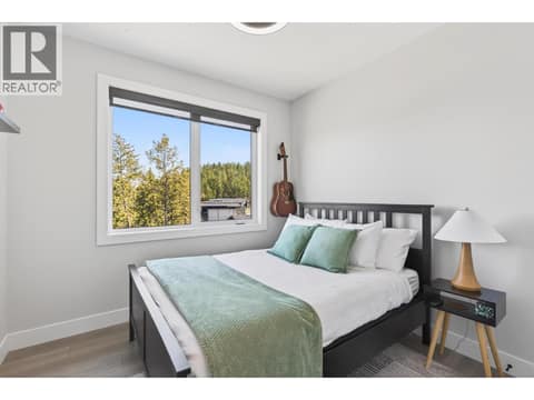 Main Level Bedroom at 1936 Northern Flicker Court, McKinley Landing, Kelowna