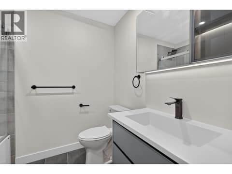Guest Bath Main Floor at 10551 Sherman Drive, Lake Country East / Oyama