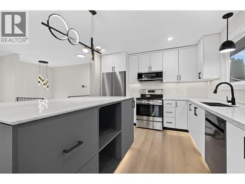 New Kitchen lots of ambient lighting at 10551 Sherman Drive, Lake Country East / Oyama