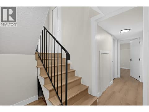 Stairs to lower level at 10551 Sherman Drive, Lake Country East / Oyama
