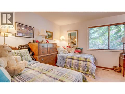 Bedroom 1 has 2 singles and lots of space. at 3200 Greenwood Road, South BX, Vernon