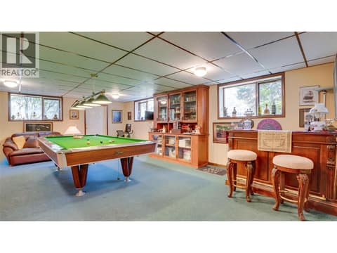 Huge family room downstairs has a separate entrance to outside. at 3200 Greenwood Road, South BX, Vernon