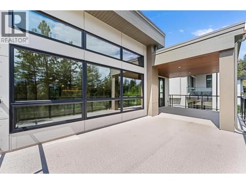 Large partially covered deck at 10313 Long Road, Lake Country South West