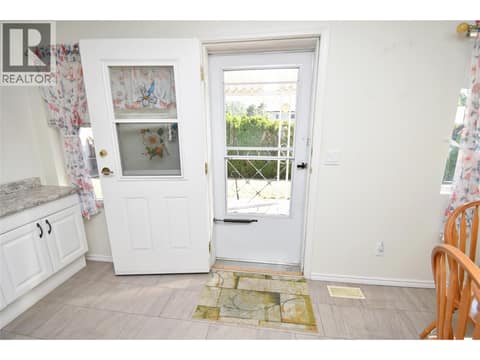 Door to covered patio at 5309 21 Street, Harwood, Vernon
