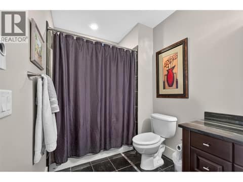 2nd full bathroom on the lower level at 734 Marin Crescent, Upper Mission, Kelowna