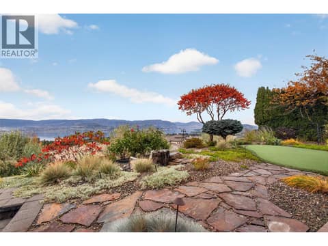 Aesthetically pleasing putting green at 734 Marin Crescent, Upper Mission, Kelowna