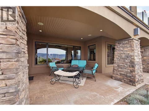 Covered patio on the lower level at 734 Marin Crescent, Upper Mission, Kelowna