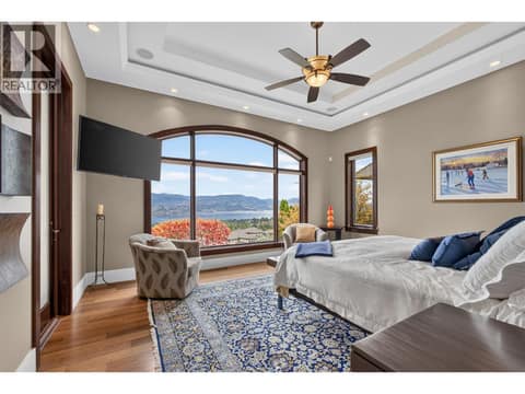 Elevated primary suite on the main level at 734 Marin Crescent, Upper Mission, Kelowna