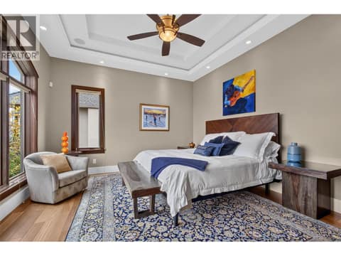 Elevated primary suite on the main level at 734 Marin Crescent, Upper Mission, Kelowna
