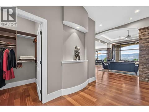 Grand foyer looks right through to the lake at 734 Marin Crescent, Upper Mission, Kelowna
