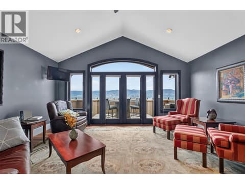 Top level loft makes the perfect office or lounge space at 734 Marin Crescent, Upper Mission, Kelowna