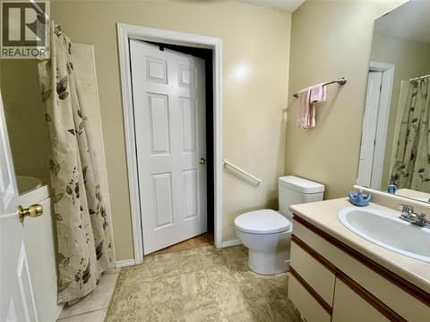 Primary ensuite has walk-in tub shower. Walk-in closet at back. at 3900 27 Avenue Unit# 74, Westmount, Vernon