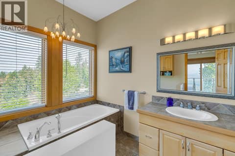 4 piece ensuite bathroom at 5705 Upper Booth N Road, Ellison, Kelowna
