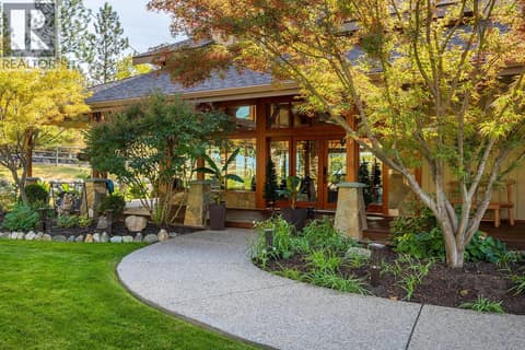 Entry walkway to the covered Wrap Around Deck into the front entrance at 5705 Upper Booth N Road, Ellison, Kelowna