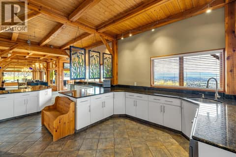 Laundry Area at 5705 Upper Booth N Road, Ellison, Kelowna