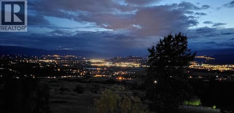 Overlooking the Beauty of the Okanagan Valley Evening from your Deck at 5705 Upper Booth N Road, Ellison, Kelowna