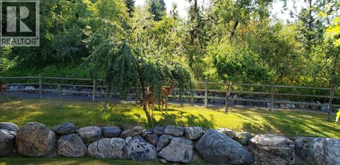 Side yard with Mini Organic Orchard at 5705 Upper Booth N Road, Ellison, Kelowna