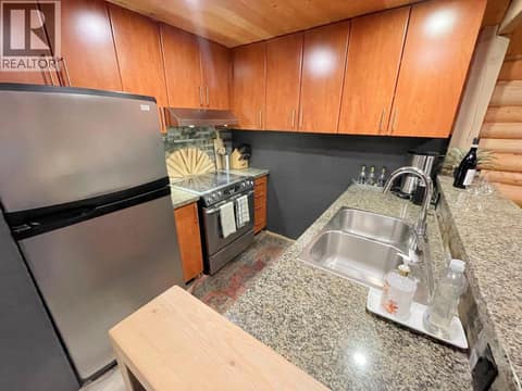Kitchen with generous counters and stainless appliances at 1166 Apex Mountain Road, Penticton Apex