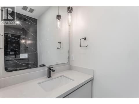 Half Bath on Main Floor at 1579 Malbec Place, Lakeview Heights, West Kelowna