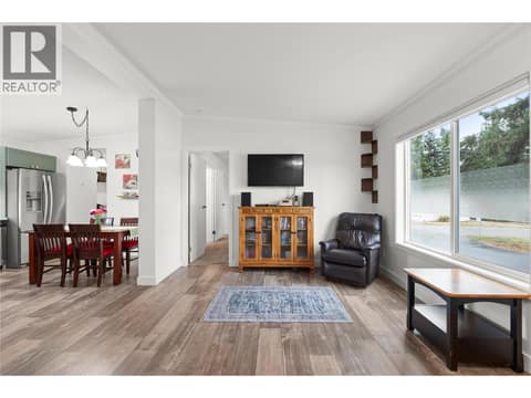 Living Room and Dining Room at 4701 Pleasant Valley Road Unit# 13, Harwood, Vernon