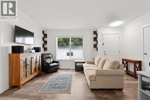 Virtually Staged Couch at 4701 Pleasant Valley Road Unit# 13, Harwood, Vernon