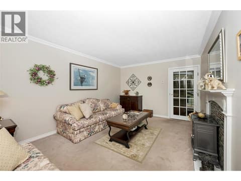 Living Room at 3300 Becker Street, Armstrong/ Spall.