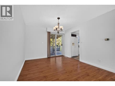 Dining room with access to the patio at 1420 Graham Road, Rutland South, Kelowna