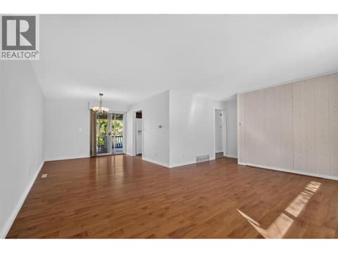 New flooring and paint throughout at 1420 Graham Road, Rutland South, Kelowna