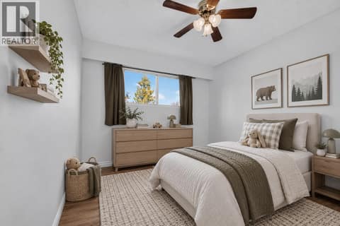 Secondary bedroom on the upper level *virtually staged* at 1420 Graham Road, Rutland South, Kelowna