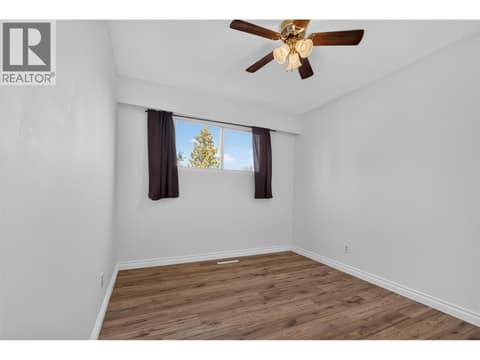 Secondary bedroom on the upper level at 1420 Graham Road, Rutland South, Kelowna