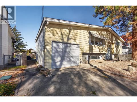 Single car garage attached to the home at 1420 Graham Road, Rutland South, Kelowna