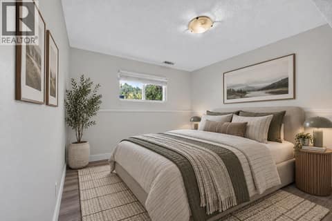 Third bedroom on the lower level *virtually staged* at 1420 Graham Road, Rutland South, Kelowna