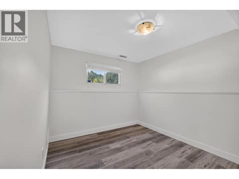 Third bedroom on the lower level at 1420 Graham Road, Rutland South, Kelowna