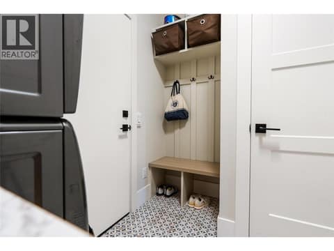 Laundry / Mud Room conveniently located off Garage at 125 Diamond Way, Predator Ridge, Vernon