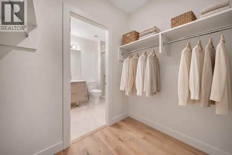 Virtually Staged Primary Walk in Closet at 3300 Lakeshore Drive Unit# 418, Lower Mission, Kelowna