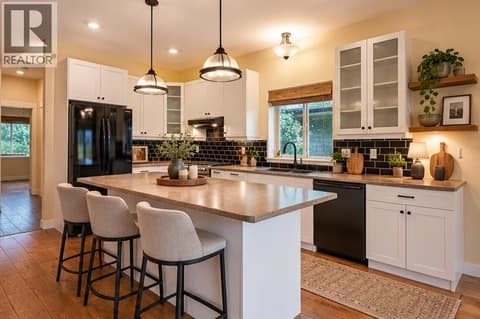 Virtually staged kitchen at 2444 York Avenue Unit# 32, Armstrong/ Spall.