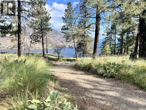 Miles of trails and spectacular Okanagan Lake views just steps away. at 183 Magic Drive, Glenmore, Kelowna