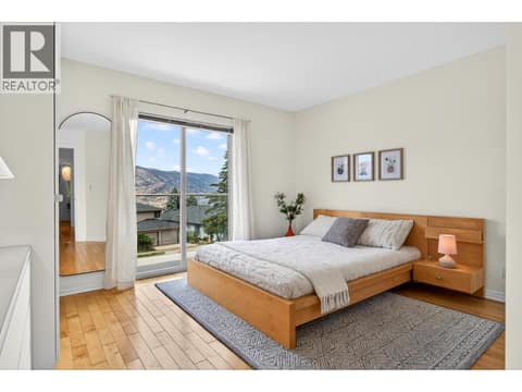 Primary bedroom with ensuite on main level at 183 Magic Drive, Glenmore, Kelowna