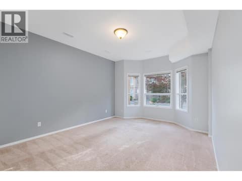 Lower Living Room at 2425 Mount Baldy Drive Unit# 19, Dilworth Mountain, Kelowna