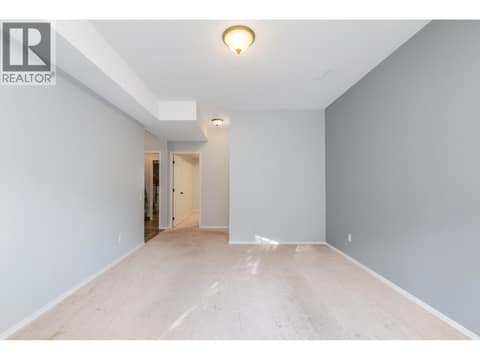 Lower Living Room at 2425 Mount Baldy Drive Unit# 19, Dilworth Mountain, Kelowna