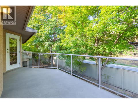 Primary Bed Door to Deck at 2425 Mount Baldy Drive Unit# 19, Dilworth Mountain, Kelowna