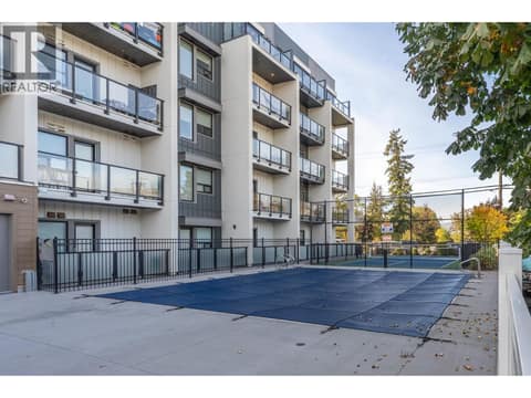 Outdoor pool and pickleball court across from the beach at 2555 Lakeshore Road Unit# 514, Okanagan Landing, Vernon