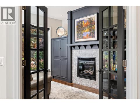 Family room located by the kitchen and breakfast nook at 3887 Gallaghers Parkway, South East Kelowna