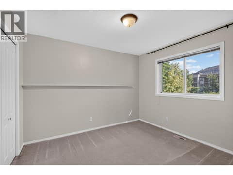 Bedroom 2 - Upstairs at 535 Glenmeadows Road Unit# 16, North Glenmore, Kelowna