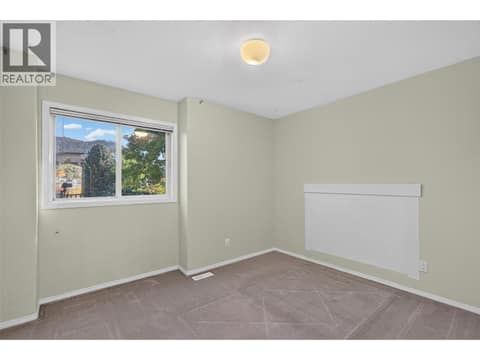 Bedroom 3 - Upstairs at 535 Glenmeadows Road Unit# 16, North Glenmore, Kelowna