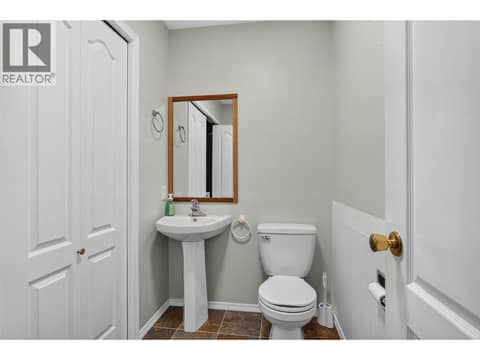 Main Floor half bath / Laundry Room at 535 Glenmeadows Road Unit# 16, North Glenmore, Kelowna