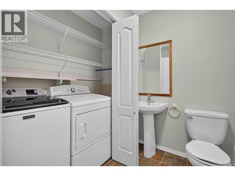 Main Floor half bath / Laundry Room at 535 Glenmeadows Road Unit# 16, North Glenmore, Kelowna