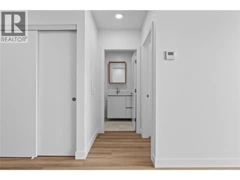 Entry to Second Bedroom and Bathroom - Photos of a similar home in the community. at 2760 Olalla Road Unit# 208, Lakeview Heights, West Kelowna