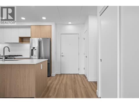 Foyer and Kitchen - Photos of a similar home in the community. at 2760 Olalla Road Unit# 208, Lakeview Heights, West Kelowna